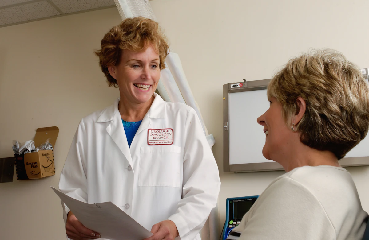 A doctor speaking with a patient during a clinic visit